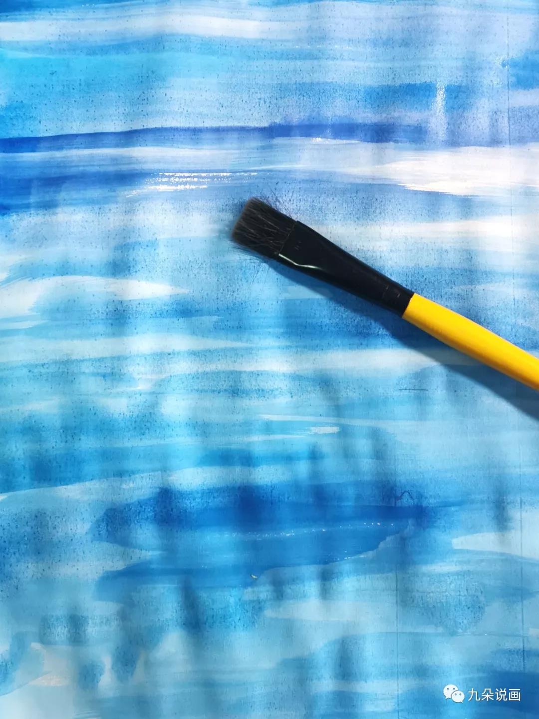 步骤1：将蓝色水粉颜料刷在白色素描纸上，注意可以有深有浅，不需要均匀。